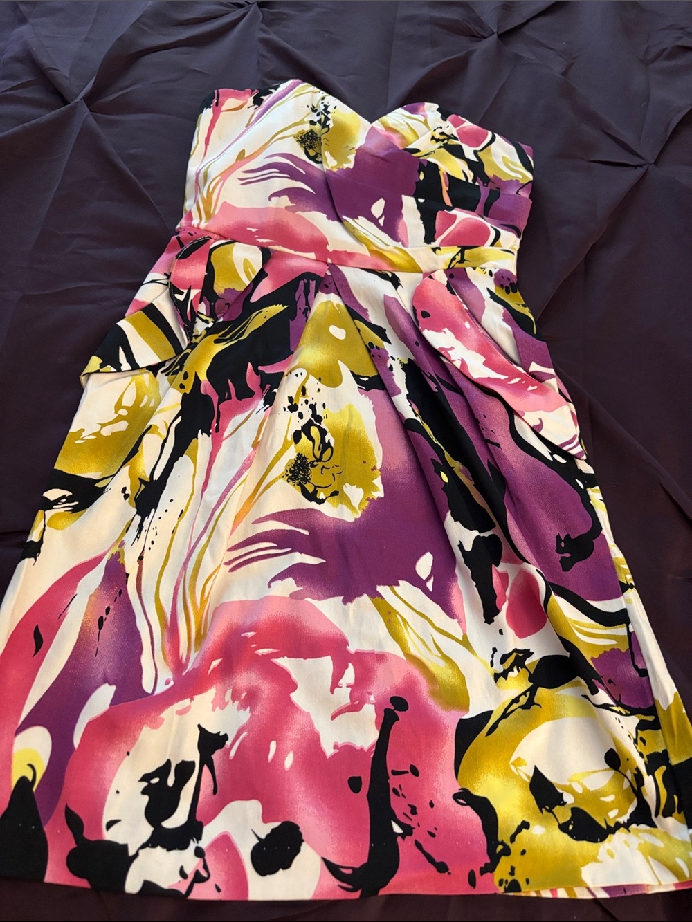 Bright , strapless dress with front pockets